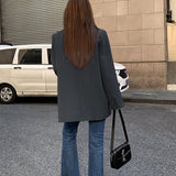 Afslappet sort blazer i retrostil