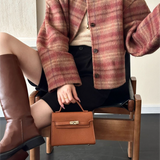 Ternet uldjakke, rund hals, enkeltradet, sænkede skuldre