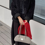 Vendbar pelsfrakke med bløde reverser