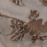 Kort, transparent cardigan med snørebånd og sløjfe foran