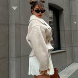 Elegant læder- og pelsfrakke med original lynlås