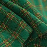 Lavtaljet ternet nederdel med broderi af bogstaver