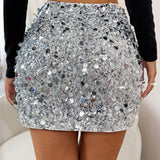 Mini bodycon-nederdel med pailletter forneden