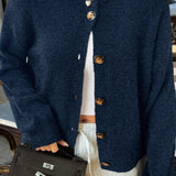 Minimalistisk cardigan med lange ærmer og knapper