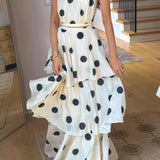 Ærmeløs sæt med halterneck top og flæset nederdel med polkaprikker