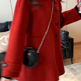 Frakke i uldblanding med frogging