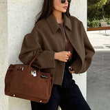 Minimalistisk cropped jakke i uld