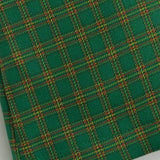 Lavtaljet ternet nederdel med broderi af bogstaver