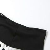 Todelt sæt med korte nederdele med polkaprikker