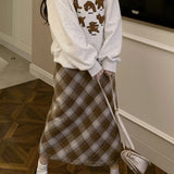 Vintage højtaljet trapeznederdel med slids