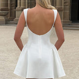 Sexet minikjole, rygløs, ærmeløs, ensfarvet