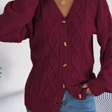 Løstsiddende, langærmet, enkeltradet strikcardigan