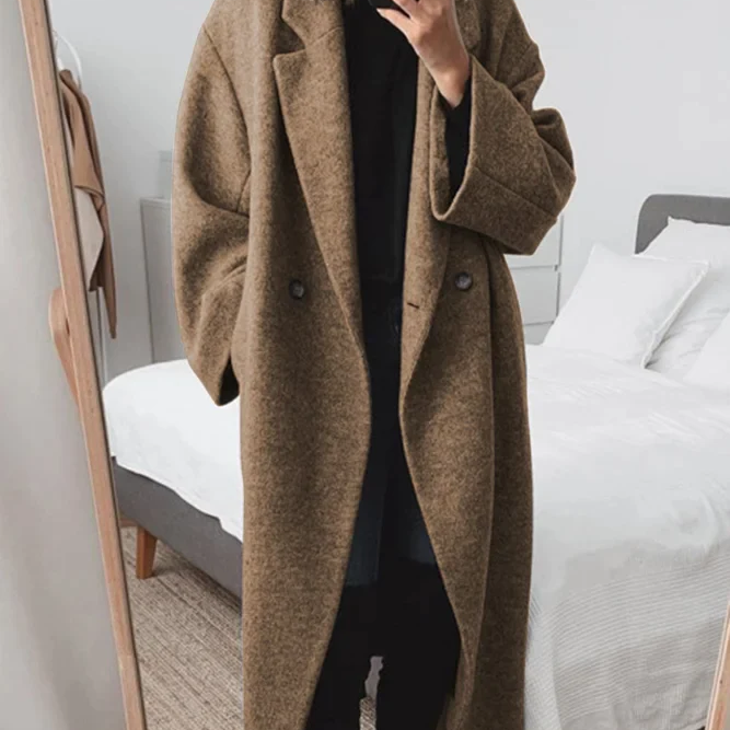 Chic og komfortabel oversized frakke, elegant, praktisk og moderne til kvinder
