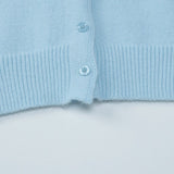 Kort vest med lange ærmer