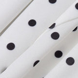 Todelt sæt med polkaprikker og off-shoulder-detaljer