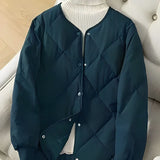 Elegant, alsidig og komfortabel sort quiltet jakke til kvinder