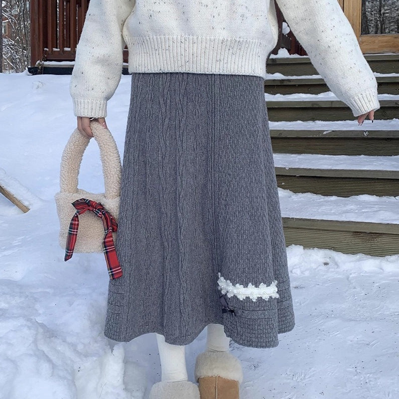 A-formet striknederdel med sløjfedetaljer