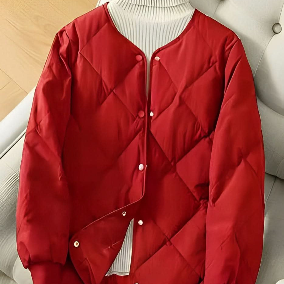 Elegant, alsidig og komfortabel sort quiltet jakke til kvinder