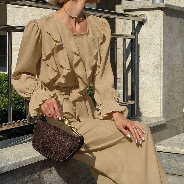 Vintage todelt sæt bestående af en top med klokkeærmer og bukser med vide ben