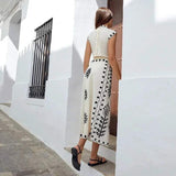 Damesæt - Broderet kortærmet crop top + højtaljet slå-om-nederdel