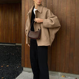 Frakke i uldblanding med flagermusærmer