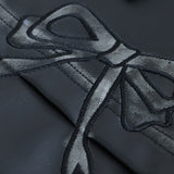 Bikerjakke i imiteret læder med dekorativ sløjfe