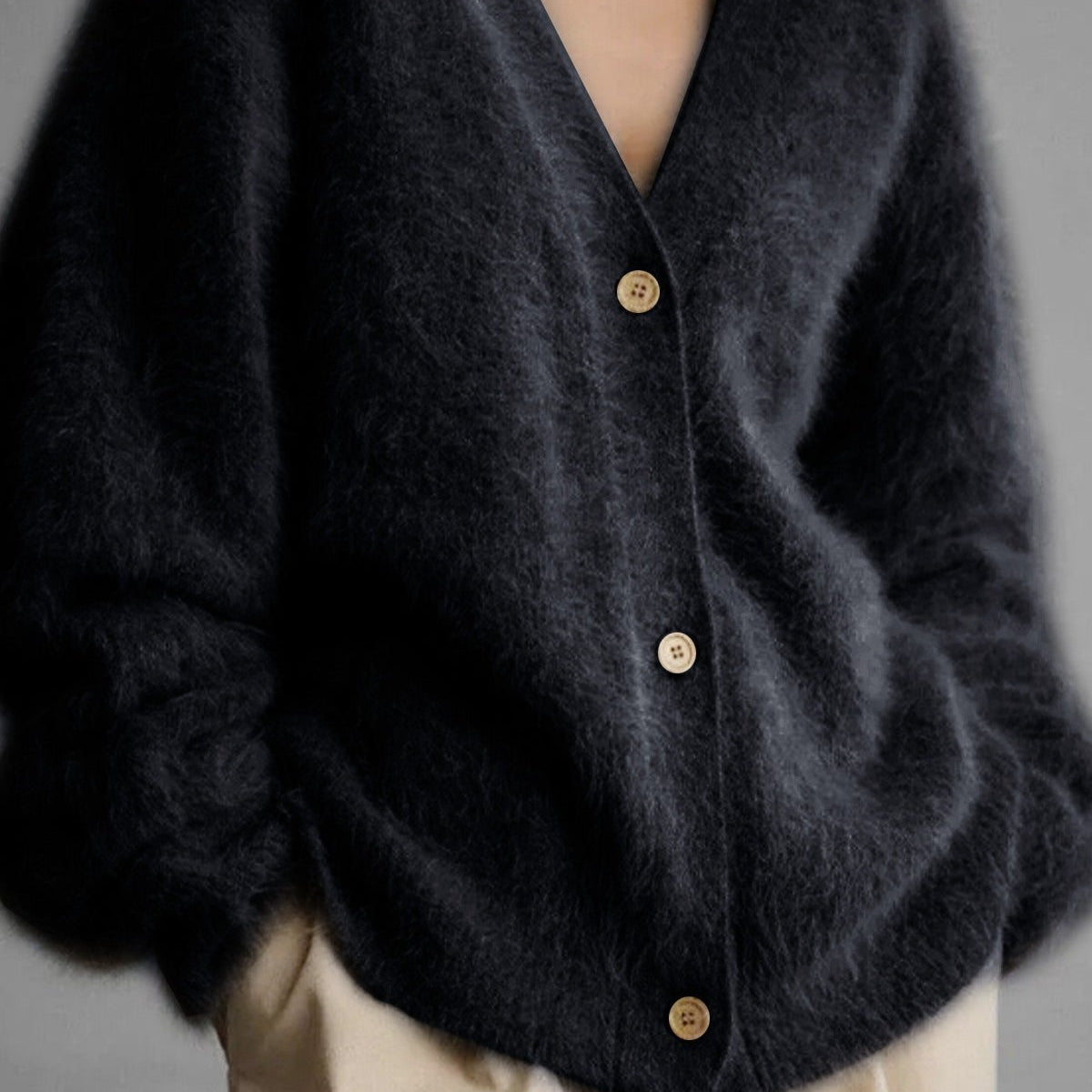 Langærmet vest med knapper foran og V-hals