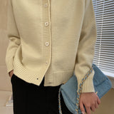 Raglanvest med jadeknapper