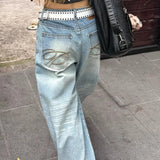 Højtaljede jeans med brede ben og broderi