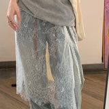 Alsidig miniskørt med et unikt lagdelt blondeforklæde og snøre