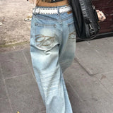 Højtaljede jeans med brede ben og broderi