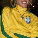 Overdimensioneret sweatshirt med lynlås og farveblokbroderi