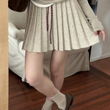 Plisseret mini-nederdel i strik