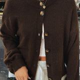 Minimalistisk cardigan med lange ærmer og knapper