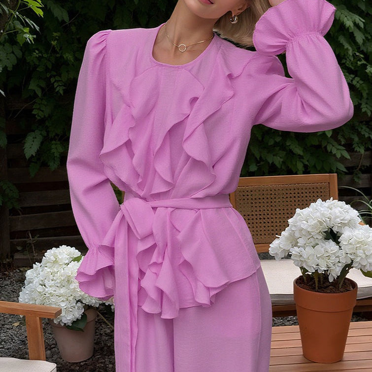 Vintage todelt sæt bestående af en top med klokkeærmer og bukser med vide ben