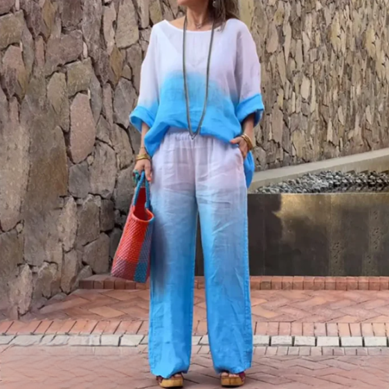 Damesæt – Løstsiddende top med bådhals og flagermusærmer + brede benbukser med elastisk talje