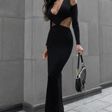 Efterårs midikjole med dyb V-hals og lange ærmer, ideel til klubaftener.