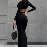 Efterårs midikjole med dyb V-hals og lange ærmer, ideel til klubaftener.