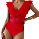 Dame badedragt i ét stykke – Dyb halsudskæring – Flæseærmer – Tyldetalje