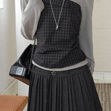 Højtaljet plisseret nederdel i ensfarvet uld