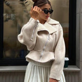 Elegant læder- og pelsfrakke med original lynlås