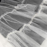 Mini aftenkjole med pufærmer og spaghettistropper