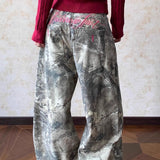 Vide jeans i hiphop-stil med camouflagevask.