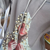 Oversized hættetrøje med grafisk perleprint i trendy streetwear-stil