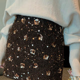 Højtaljet trapeznederdel broderet med pailletter