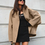 Frakke i uldblanding med flagermusærmer