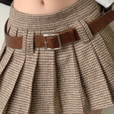 Højtaljet plisseret nederdel med houndstooth-mønster