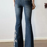 Vintage bootcut jeans med plantebroderi