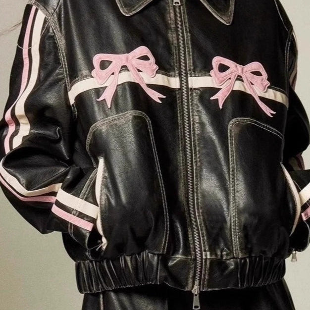 Bikerjakke i imiteret læder med dekorativ sløjfe