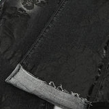 Vintage jeans med svaj og botanisk print